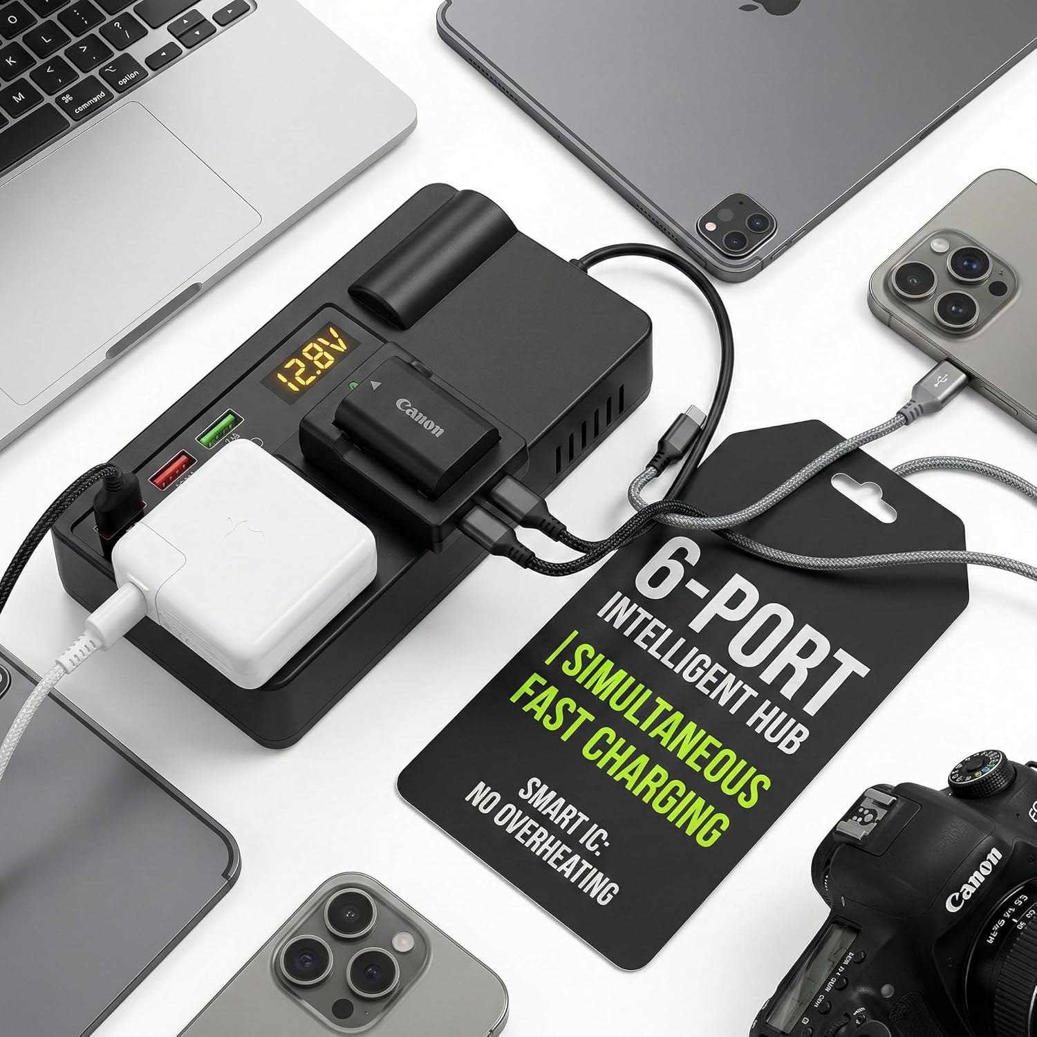 EchoRepel car inverter charging a laptop, a camera battery and phones at the same time